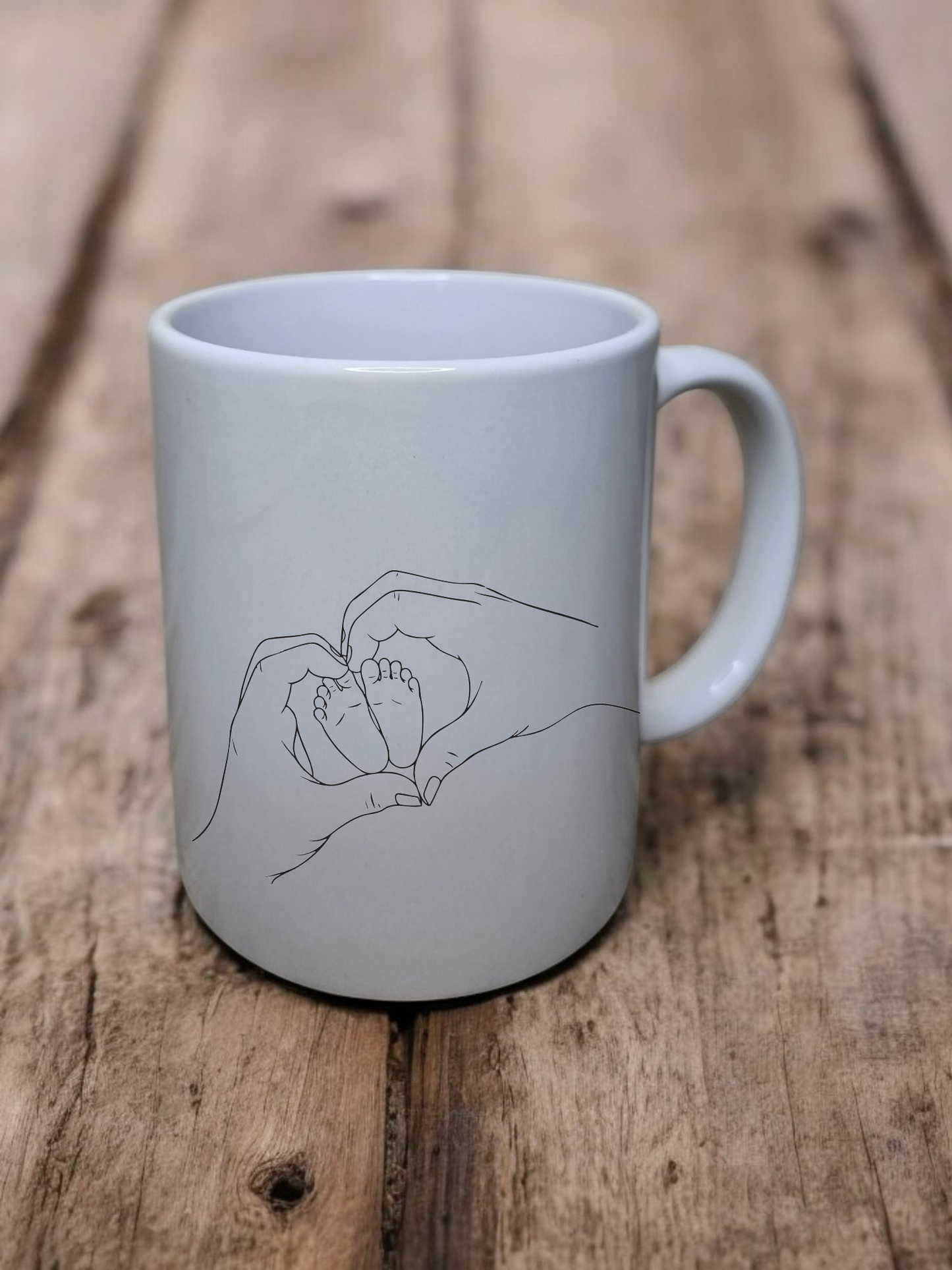 Babytasse mit liebevollem Fußabdruck-Motiv